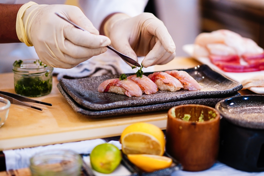 Selective focus on the Sushi that Japanese Sushi Chef making Sushi. Omakase sushi course.