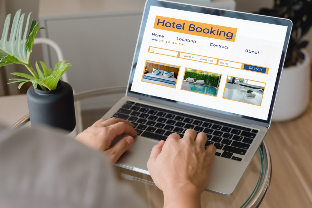 booking online hotel person using laptop computer planning travel search hotel booking in advance.