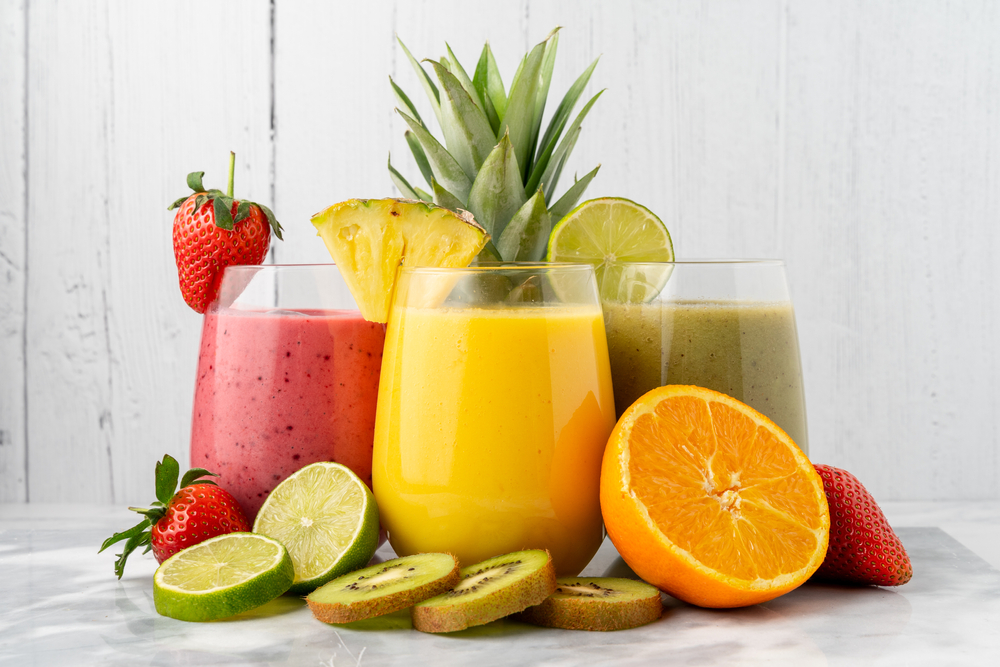 Variety of organic fruit smoothies, with their ingredients.