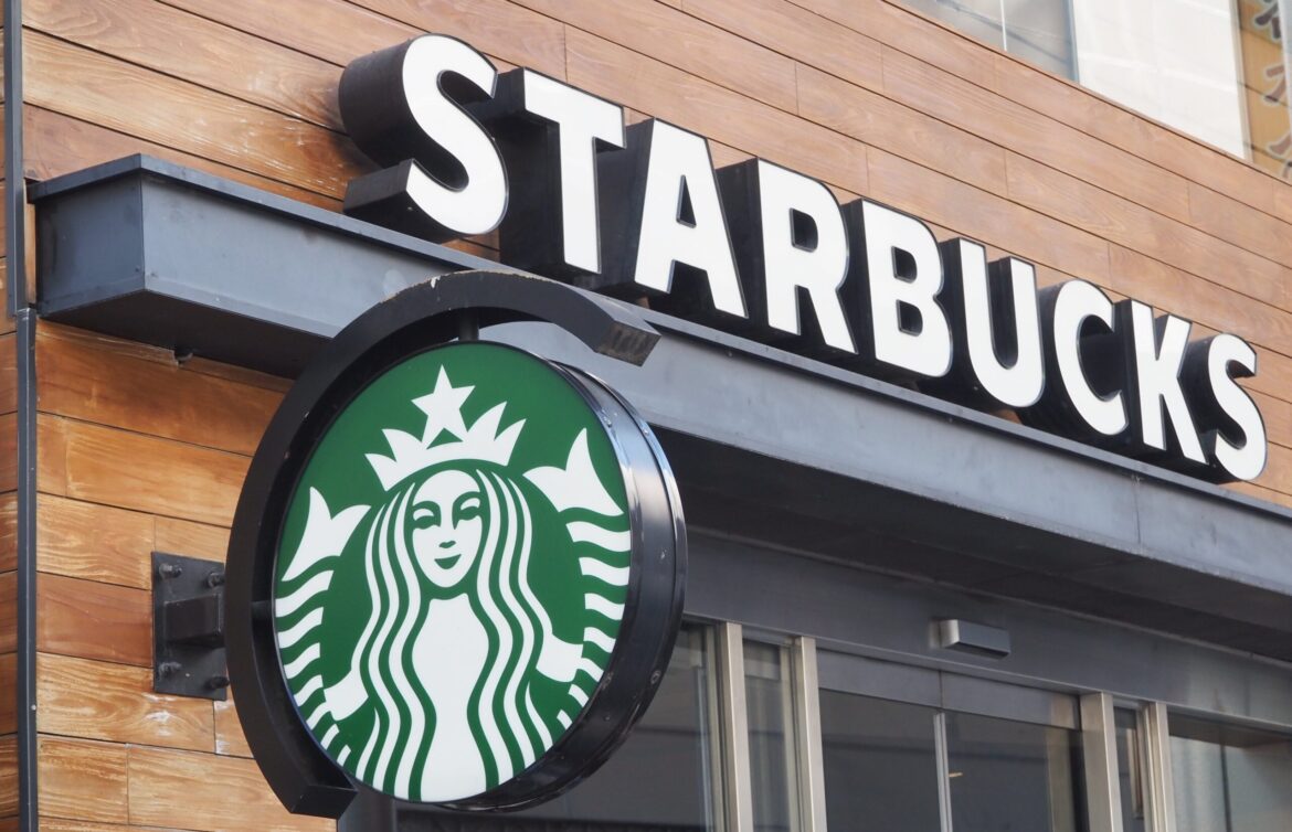 Starbucks outlet picture from outside with starbucks logo in focus